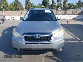 2014 Subaru Forester Premium with VIN JF2SJAEC5EH551632, listed as a IAAI auction lot 42640444 with 240,591 mi miles and . Bid and sale history available at DreamBid. Image 12.