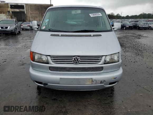 2003 Volkswagen EuroVan с VIN WV2KB47093H041606, выставлен на аукционе Copart как лот 73808224 с пробегом 228 496 миль миль и Чистый • Clean title. История ставок и продаж доступна на DreamBid. Изображение 5.