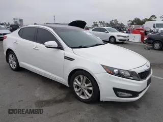 2013 Kia Optima EX z VIN 5XXGN4A75DG099762, wystawiony jako IAAI lot #42443408 z przebiegiem 110 189 mil mil oraz . Historia ofert i sprzedaży dostępna na DreamBid. Obrazek 1.