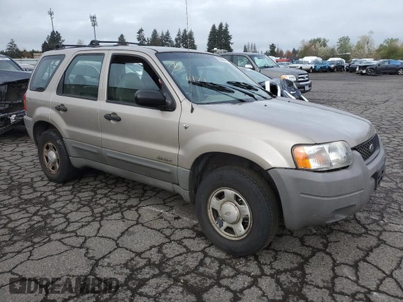 2001 Ford Escape XLS with VIN 1FMYU02111KA37010, listed as a Copart auction lot 52328415 with 312,425 mi miles and Salvage title. Bid and sale history available at DreamBid. Image 4.