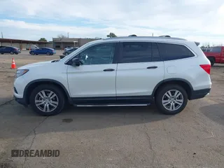 2016 Honda Pilot LX with VIN 5FNYF6H1XGB009768, listed as a IAAI auction lot 41666109 with 137,733 mi miles. Bid and sale history available at carsss.com. Image 14.