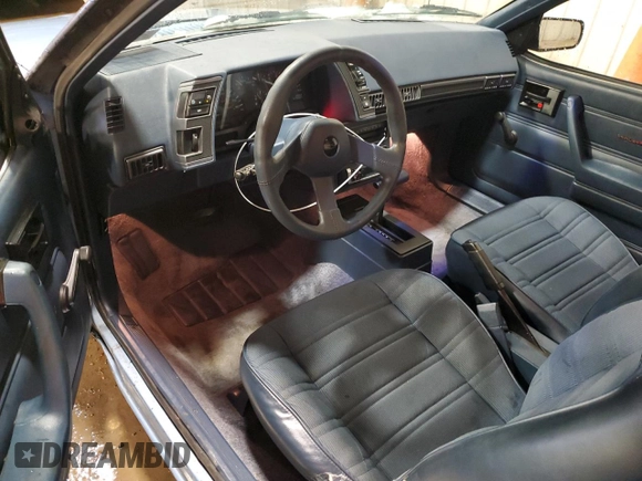 1989 Chevrolet Cavalier with VIN 1G1JC1113KJ278292, listed as a Copart auction lot 44942375 with 85,604 mi miles and Salvage Title. Bid and sale history available at DreamBid. Image 8.