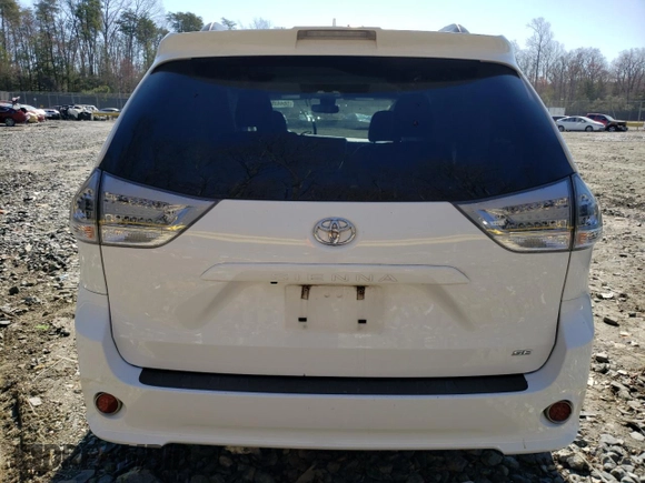 2018 Toyota Sienna SE with VIN 5TDXZ3DC9JS937339, listed as a Copart auction lot 50447875 with 129,144 mi miles and Salvage title. Bid and sale history available at DreamBid. Image 6.