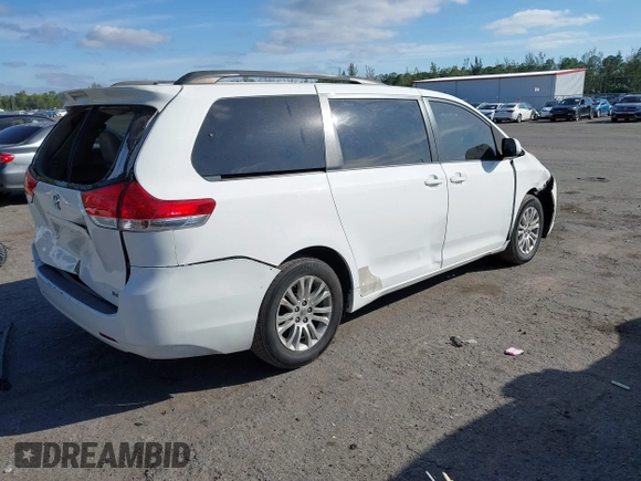 2012 Toyota Sienna XLE AAS with VIN 5TDYK3DC0CS254294, listed as a IAAI auction lot 41274822 with 135,135 mi miles and . Bid and sale history available at carsss.com. Image 4.