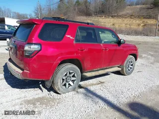 2022 Toyota 4Runner TRD Off Road with VIN JTEPU5JR1N6073522, listed as a IAAI auction lot 41617512 with 52,435 mi miles. Bid and sale history available at carsss.com. Image 4.