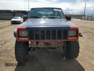 1999 Jeep Cherokee Sport with VIN 1J4FF68S6XL574980, listed as a Copart auction lot 51639635 with 257,854 mi miles and Salvage Title. Bid and sale history available at carsss.com. Image 5.
