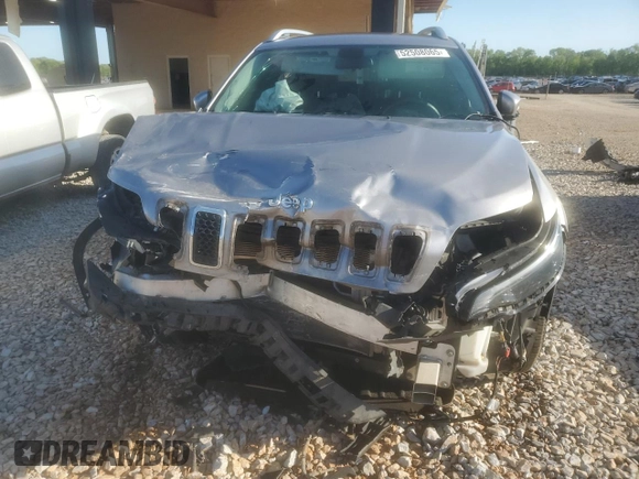 2019 Jeep Cherokee Latitude with VIN 1C4PJLCX4KD110812, listed as a Copart auction lot 52508065 with 126,861 mi miles and Salvage title. Bid and sale history available at DreamBid. Image 5.