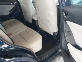 2014 Mazda CX-5 Grand Touring with VIN JM3KE2DY6E0394172, listed as a IAAI auction lot 41698468 with 89,554 mi miles. Bid and sale history available at carsss.com. Image 8.