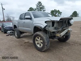 2017 Toyota Tacoma SR with VIN 5TFAX5GN0HX083950, listed as a IAAI auction lot 41519388 with 130,211 mi miles. Bid and sale history available at carsss.com. Image 1.