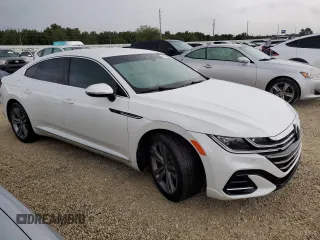 2023 Volkswagen Arteon SEL R-Line z VIN WVWSR7ANXPE013112, wystawiony jako Copart lot #74192954 z przebiegiem Nie podano mil oraz Szkoda całkowita • Salvage title. Historia ofert i sprzedaży dostępna na DreamBid. Obrazek 4.