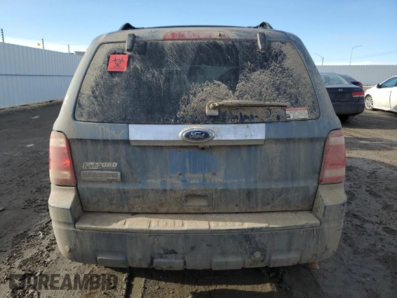 2010 Ford Escape Limited with VIN 1FMCU9E77AKD23121, listed as a Copart auction lot 50243295 with Not provided miles and Salvage title. Bid and sale history available at DreamBid. Image 6.