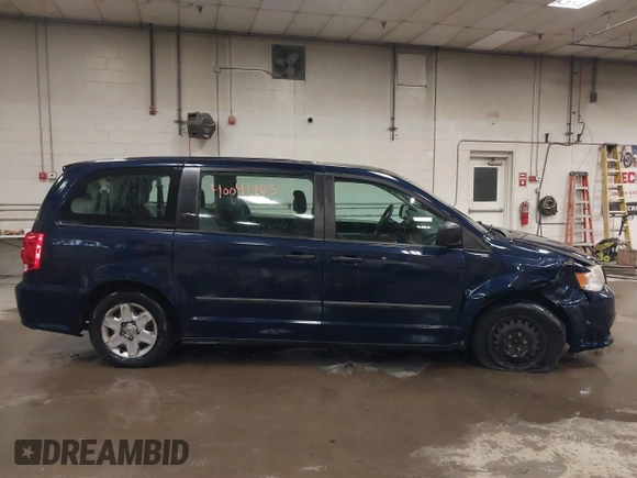 2012 Dodge Grand Caravan SE with VIN 2C4RDGBG8CR367236, listed as a IAAI auction lot 40041863 with 166,555 mi miles and . Bid and sale history available at DreamBid. Image 13.