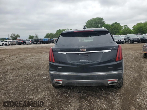 2023 Cadillac XT5 AWD Premium Luxury with VIN 1GYKNDR45PZ224937, listed as a Copart auction lot 57599125 with 12,905 mi miles and Salvage title. Bid and sale history available at DreamBid. Image 6.