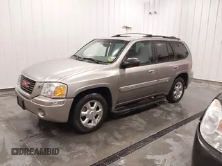 2003 GMC Envoy SLT with VIN 1GKDT13S932395367, listed as a IAAI auction lot 41544810 with 142,012 mi miles. Bid and sale history available at carsss.com. Image 16.