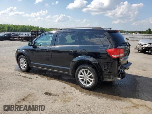 2014 Dodge Journey SXT with VIN 3C4PDCBG5ET126590, listed as a Copart auction lot 54770335 with 126,950 mi miles and Salvage Title. Bid and sale history available at DreamBid. Image 2.