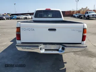 1999 Toyota Tacoma z VIN 4TAVL52N7XZ567598, wystawiony jako Copart lot #55141495 z przebiegiem 225 505 mil mil oraz Szkoda całkowita • Salvage title. Historia ofert i sprzedaży dostępna na DreamBid. Obrazek 6.