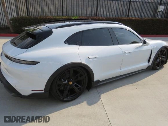 2022 Porsche Taycan 4 with VIN WP0BA2Y19NSA67581, listed as a Copart auction lot 55142525 with 6,775 mi miles and Salvage Title. Bid and sale history available at DreamBid. Image 3.