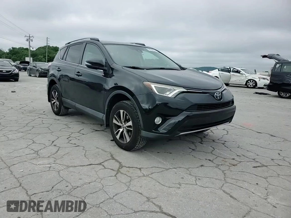 2018 Toyota RAV4 XLE with VIN 2T3WFREV4JW429334, listed as a Copart auction lot 56934855 with 117,761 mi miles and Salvage title. Bid and sale history available at DreamBid. Image 13.