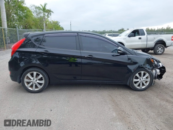 2013 Hyundai Accent SE with VIN KMHCU5AE8DU109616, listed as a IAAI auction lot 42051364 with 96,739 mi miles. Bid and sale history available at carsss.com. Image 14.