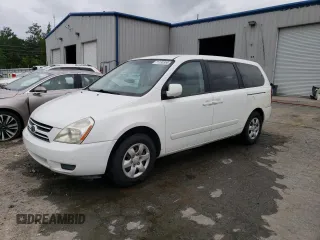 2006 Kia Sedona LX with VIN KNDMB233466022537, listed as a Copart auction lot 71130354 with 215,997 mi miles and Salvage Title. Bid and sale history available at carsss.com. Image 1.
