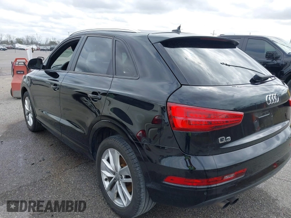 2018 Audi Q3 Premium z VIN WA1BCCFS8JR013032, wystawiony jako IAAI lot #41706173 z przebiegiem 111 402 mil mil oraz . Historia ofert i sprzedaży dostępna na DreamBid. Obrazek 3.