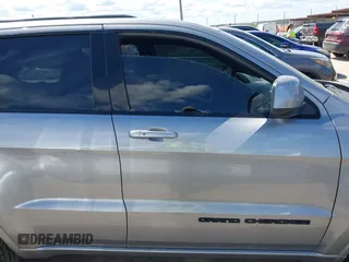 2021 Jeep Grand Cherokee Laredo X z VIN 1C4RJEAG9MC739515, wystawiony jako IAAI lot #42184910 z przebiegiem 45 687 mil mil oraz . Historia ofert i sprzedaży dostępna na DreamBid. Obrazek 13.