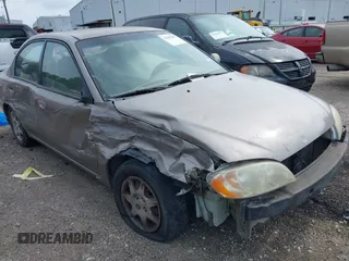 2002 Kia Spectra z VIN KNAFB121825151638, wystawiony jako IAAI lot #42397007 z przebiegiem 124 212 mil mil oraz . Historia ofert i sprzedaży dostępna na DreamBid. Obrazek 1.