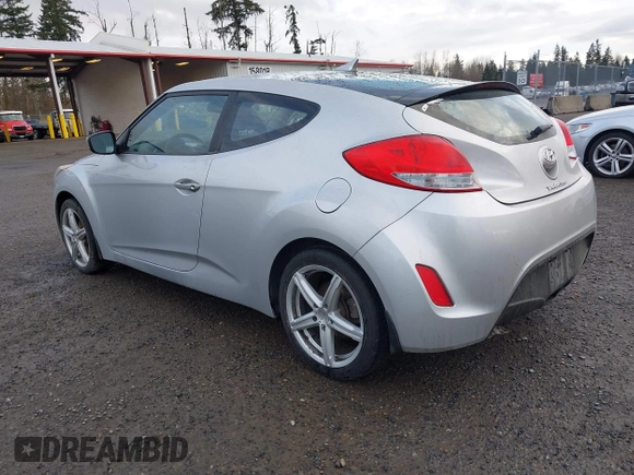 2012 Hyundai Veloster w/Gray Int with VIN KMHTC6AD8CU063977, listed as a IAAI auction lot 41494419 with 192,179 mi miles and . Bid and sale history available at DreamBid. Image 3.