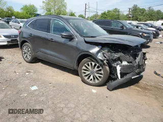2020 Ford Escape Titanium с VIN 1FMCU9J99LUC63261, выставлен на аукционе Copart как лот 56312955 с пробегом Не указан миль и Списание • Salvage title. История ставок и продаж доступна на DreamBid. Изображение 4.