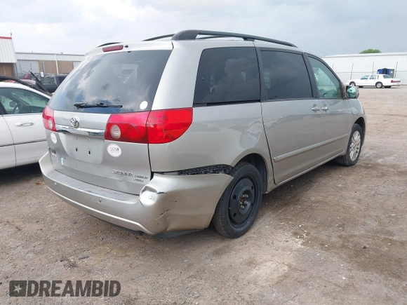 2007 Toyota Sienna XLE z VIN 5TDBK22C07S005499, wystawiony jako IAAI lot #42304686 z przebiegiem 179 721 mil mil oraz . Historia ofert i sprzedaży dostępna na DreamBid. Obrazek 4.