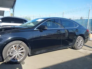 2016 Lexus ES 300h z VIN JTHBW1GG1G2121262, wystawiony jako IAAI lot #41959615 z przebiegiem 131 247 mil mil oraz . Historia ofert i sprzedaży dostępna na DreamBid. Obrazek 14.