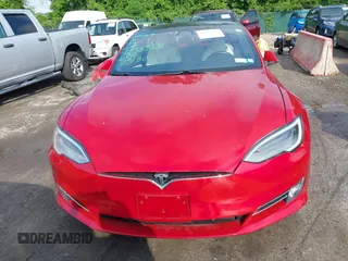 2020 Tesla Model S Long Range with VIN 5YJSA1E25LF396213, listed as a IAAI auction lot 42383231 with 73,125 mi miles and . Bid and sale history available at DreamBid. Image 12.