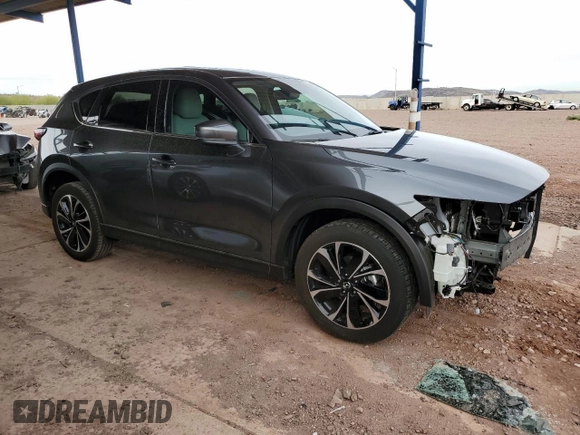 2022 Mazda CX-5 2.5 S Premium Package with VIN JM3KFBDM8N0590642, listed as a Copart auction lot 48996015 with 12,654 mi miles and Salvage Title. Bid and sale history available at carsss.com. Image 4.