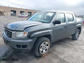 2011 Honda Ridgeline RT with VIN 5FPYK1F27BB453796, listed as a IAAI auction lot 41126251 with 122,746 mi miles. Bid and sale history available at carsss.com. Image 2.