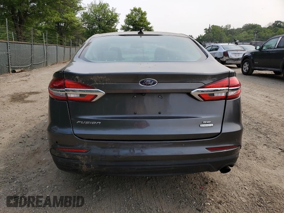 2020 Ford Fusion SE with VIN 3FA6P0HD0LR249194, listed as a Copart auction lot 59510625 with 74,932 mi miles and Salvage title. Bid and sale history available at DreamBid. Image 6.