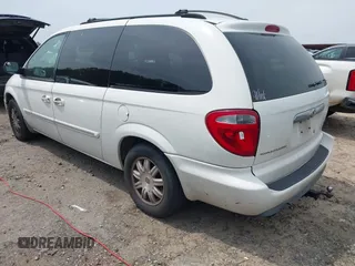 2006 Chrysler Town & Country Touring with VIN 2A4GP54L46R859144, listed as a IAAI auction lot 42037427 with 265,354 mi miles and . Bid and sale history available at DreamBid. Image 3.