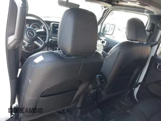 2021 Jeep Wrangler Unlimited Sahara z VIN 1C4HJXEN2MW528137, wystawiony jako IAAI lot #42134514 z przebiegiem 50 030 mil mil oraz . Historia ofert i sprzedaży dostępna na DreamBid. Obrazek 20.