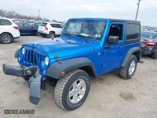2015 Jeep Wrangler Sport with VIN 1C4AJWAG9FL747491, listed as a IAAI auction lot 41849106 with 84,226 mi miles. Bid and sale history available at carsss.com. Image 17.
