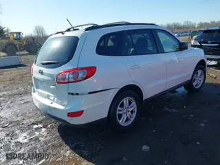 2010 Hyundai Santa Fe GLS with VIN 5NMSG3AB2AH393670, listed as a IAAI auction lot 41822377 with 166,522 mi miles. Bid and sale history available at carsss.com. Image 4.