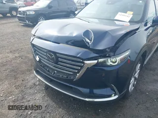 2020 Mazda CX-9 Grand Touring with VIN JM3TCBDY1L0402718, listed as a IAAI auction lot 42355511 with 87,205 mi miles and . Bid and sale history available at DreamBid. Image 6.