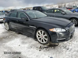 2015 Jaguar XJ Portfolio z VIN SAJWJ2GD4F8V79582, wystawiony jako Copart lot #42121395 z przebiegiem 65 017 mil mil oraz Szkoda całkowita • Salvage title. Historia ofert i sprzedaży dostępna na DreamBid. Obrazek 4.