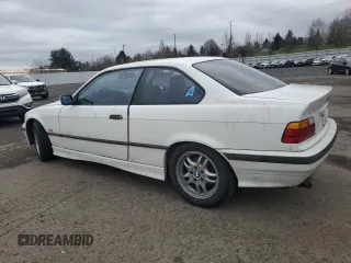 1997 BMW 3 Series 328is with VIN WBABG132XVET04869, listed as a Copart auction lot 45774015 with 123,280 mi miles and Salvage Title. Bid and sale history available at carsss.com. Image 2.