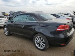 2015 Volkswagen Eos Komfort with VIN WVWBW8AH4FV001321, listed as a Copart auction lot 78718404 with 73,296 mi miles and Salvage Title. Bid and sale history available at DreamBid. Image 2.