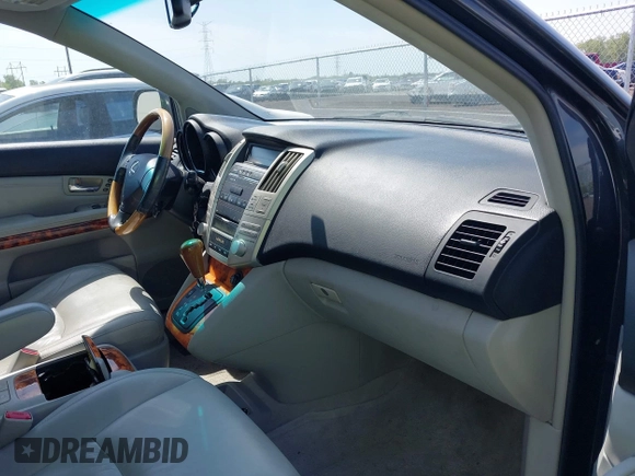 2007 Lexus RX with VIN 2T2GK31U07C021695, listed as a IAAI auction lot 42032252 with 146,023 mi miles. Bid and sale history available at carsss.com. Image 5.