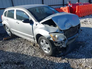 2009 Dodge Caliber SXT with VIN 1B3HB48A99D143067, listed as a IAAI auction lot 40989643 with 132,534 mi miles and . Bid and sale history available at carsss.com. Image 1.