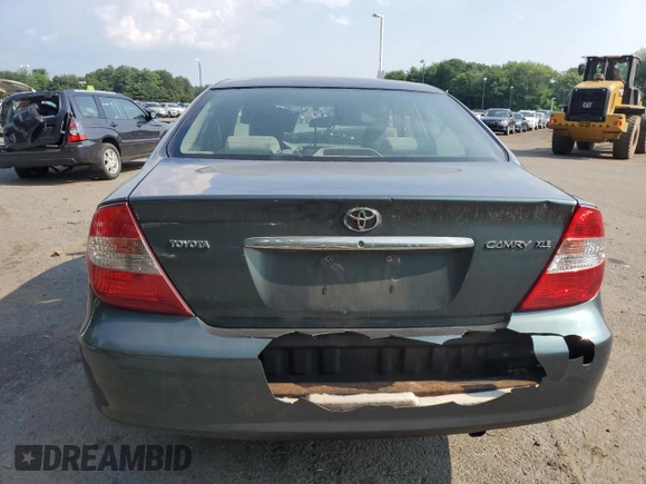 2004 Toyota Camry LE with VIN 4T1BE30K04U290232, listed as a Copart auction lot 59788975 with Not provided miles and Salvage title. Bid and sale history available at DreamBid. Image 6.