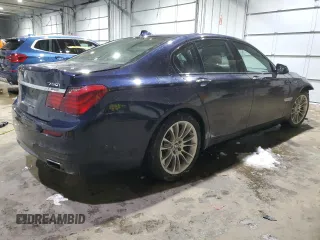 2015 BMW 7 Series 750i xDrive with VIN WBAYB6C57FD965931, listed as a Copart auction lot 44422205 with 100,702 mi miles and Salvage title. Bid and sale history available at DreamBid. Image 3.