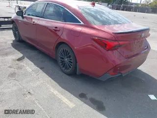 2019 Toyota Avalon Hybrid Limited with VIN 4T1B21FB4KU009762, listed as a IAAI auction lot 41707299 with 156,143 mi miles. Bid and sale history available at carsss.com. Image 3.
