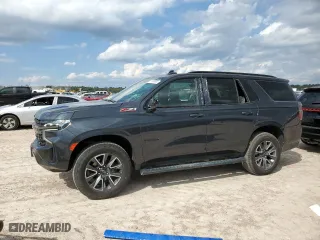 2022 Chevrolet Tahoe Z71 with VIN 1GNSKPKD3NR165367, listed as a Copart auction lot 73148944 with 44,235 mi miles and Salvage Title. Bid and sale history available at carsss.com. Image 1.