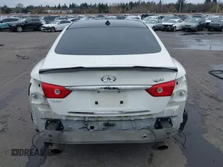 2014 Infiniti Q50 Premium z VIN JN1BV7AP8EM671403, wystawiony jako IAAI lot #41837716 z przebiegiem 115 058 mil mil oraz . Historia ofert i sprzedaży dostępna na DreamBid. Obrazek 17.